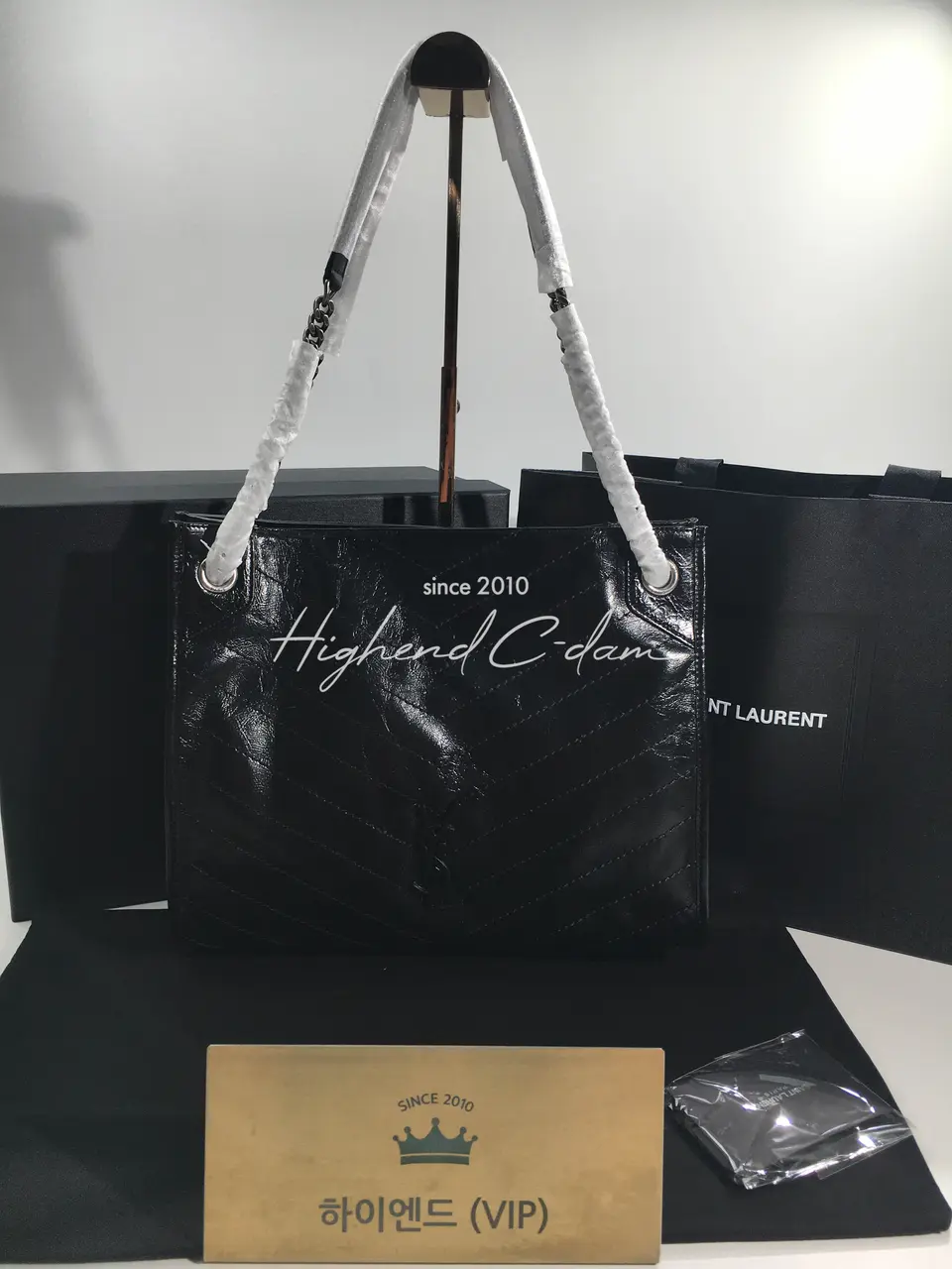 생로랑 니키 체인 미디움 쇼핑백 577999