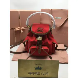 미우미우 엠보싱로고 캔버스 및 가죽 백팩 스몰, 미디움