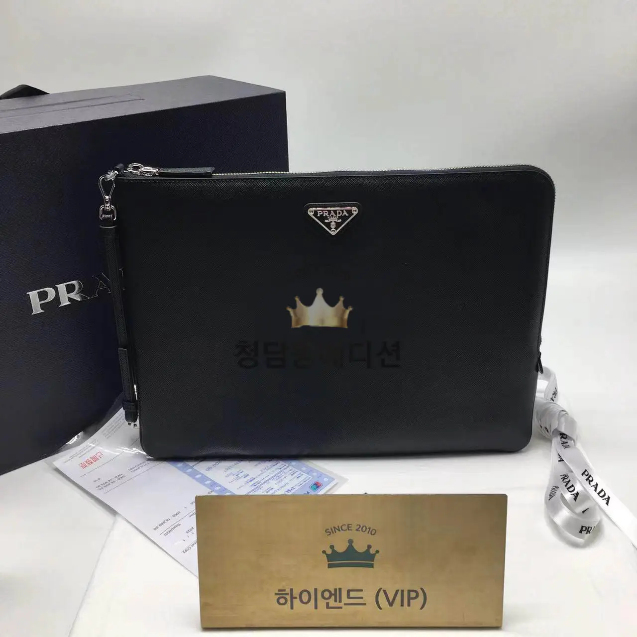 프라다 사피아노 삼각로고 클러치백
